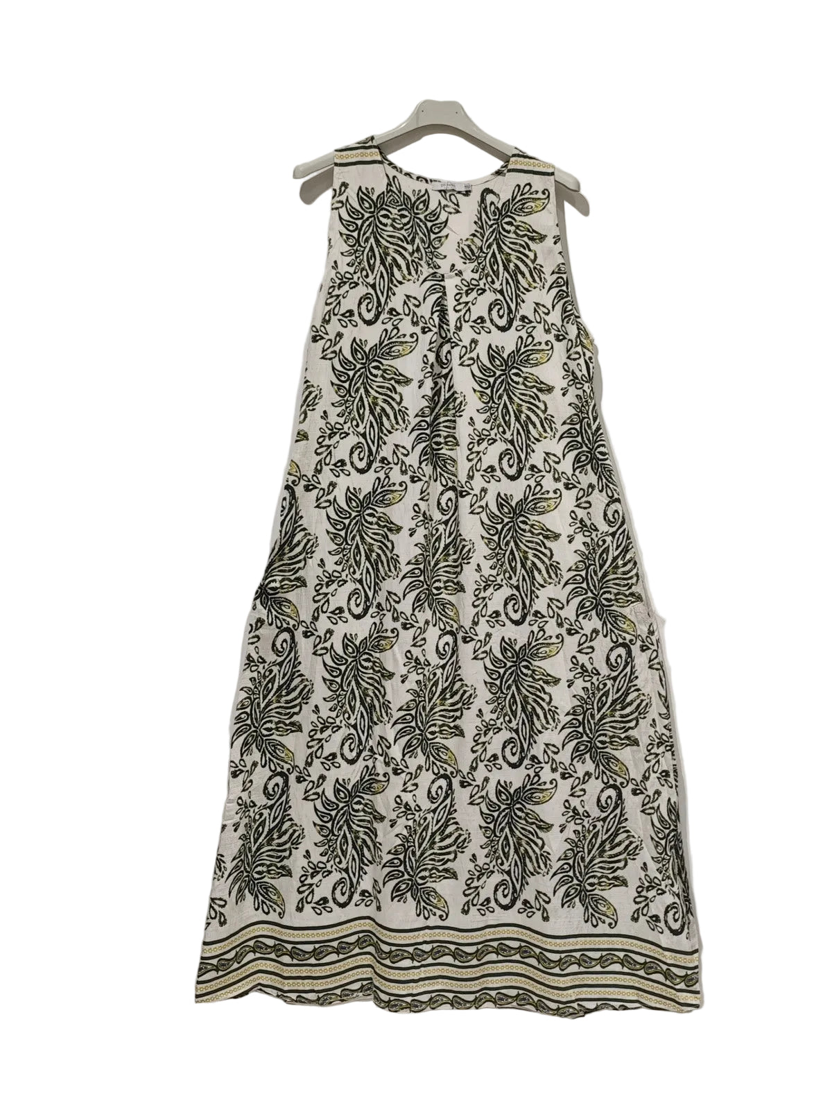 White dress with khaki floral pattern on a hanger against a white background