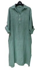Green dress on a hanger against a white background
