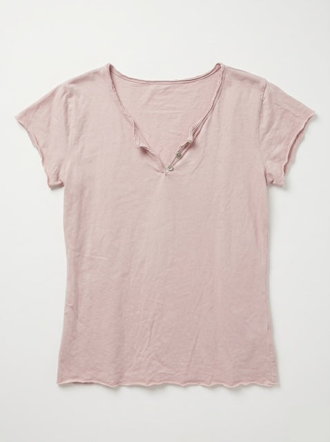 A light pink short-sleeve V-neck t-shirt with a raw hem, laid flat against a light gray background.