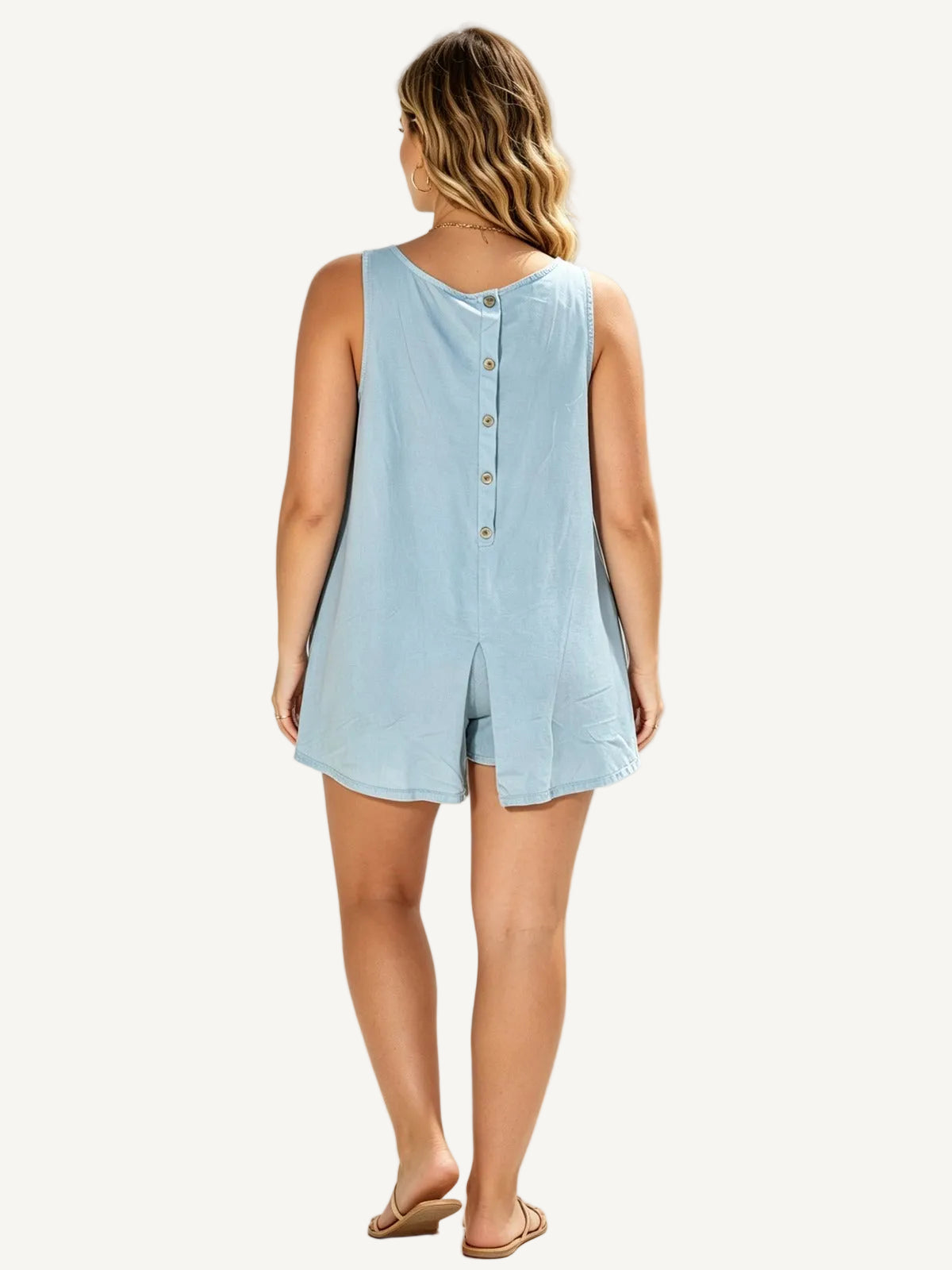 Woman wearing a sky blue sleeveless top