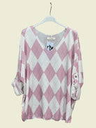 Pink and white printed top with v neck