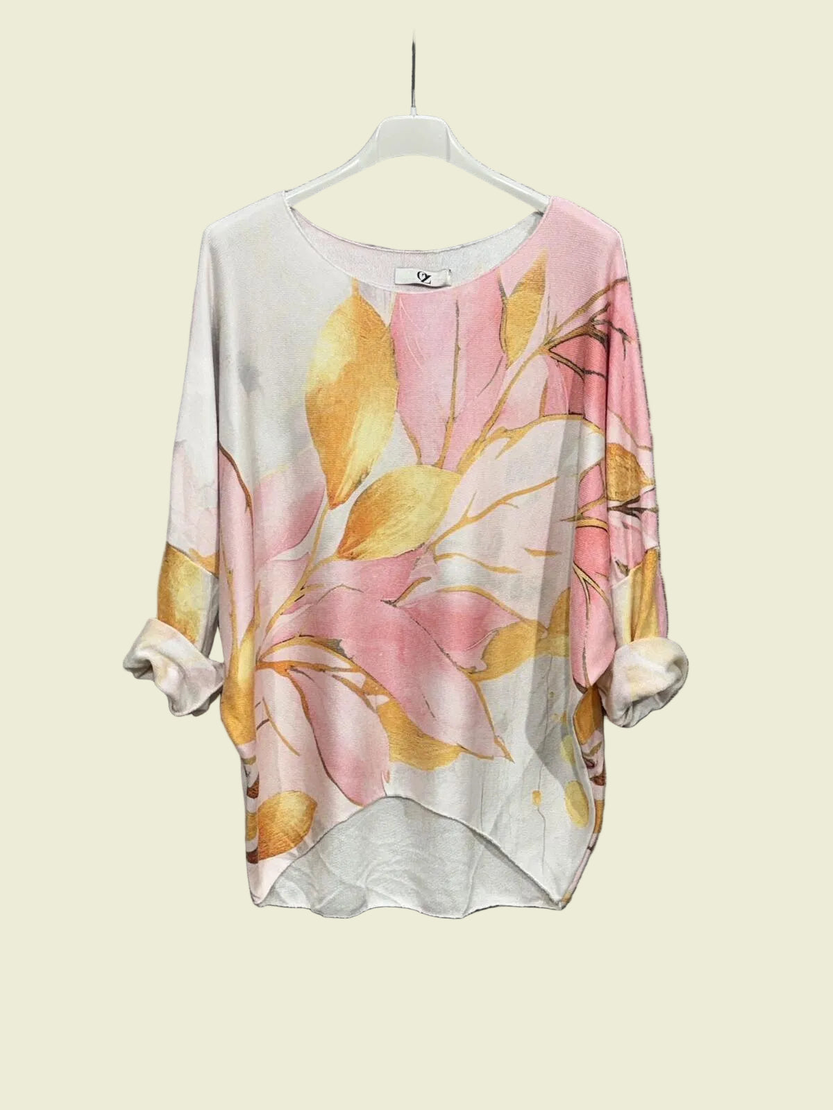 Floral patterned shirt on a hanger 