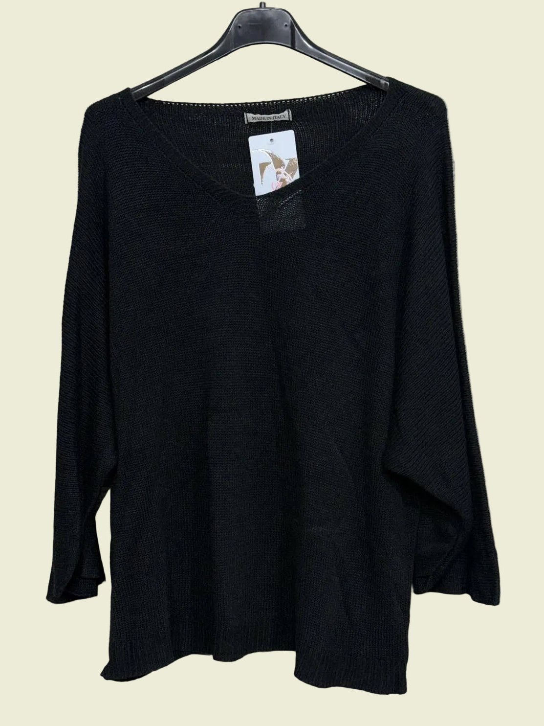 Black sweater on a hanger