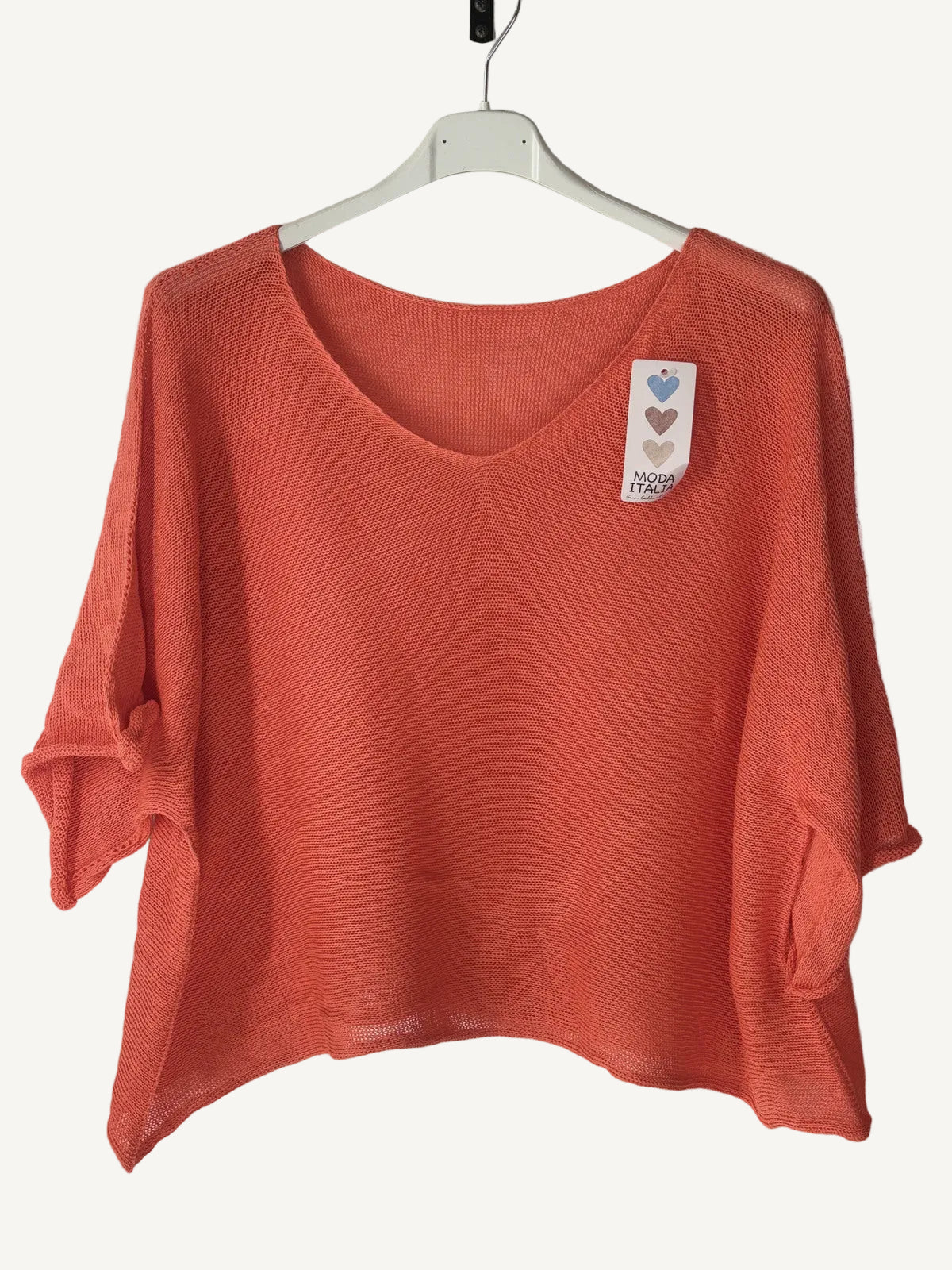 Orange sweater with a v neck 
