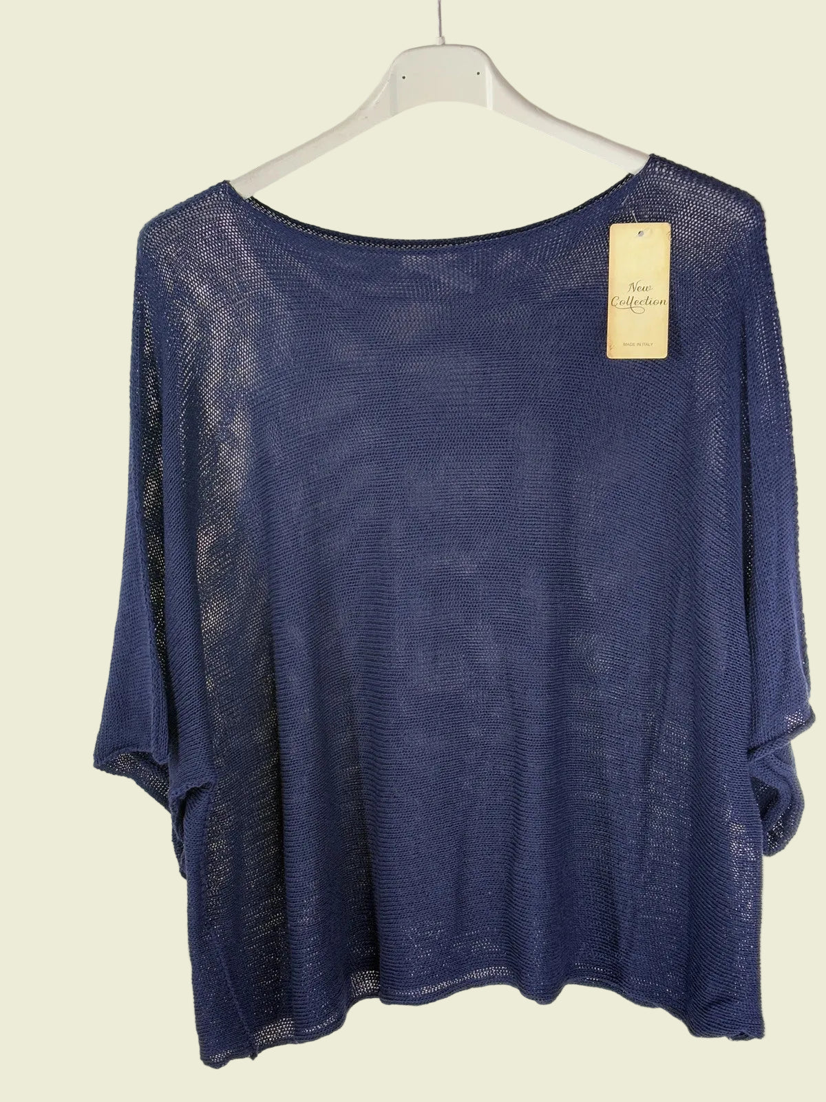 Blue top on a hanger 
