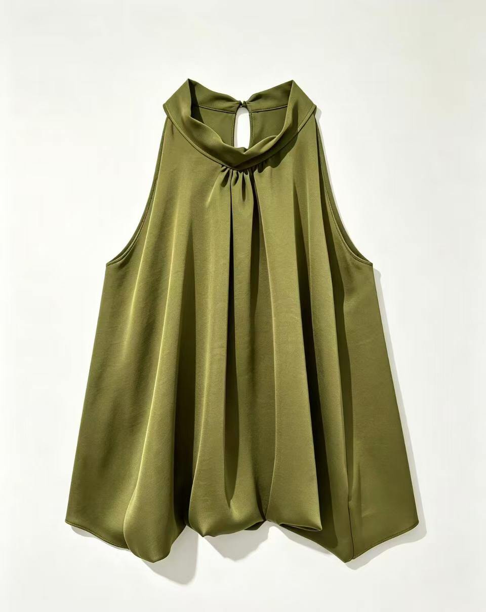 A lime green sleeveless top with a draped high neckline and a tie-front detail, displayed against a plain white background.