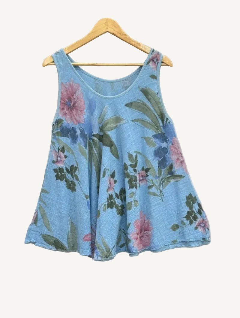 Blue floral tank top on a wooden hanger 