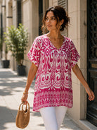Fuchsia printed v neck tunic top