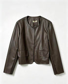 A dark brown faux leather jacket with a round neckline and two front flap pockets
