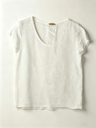 White t-shirt on a light gray background
