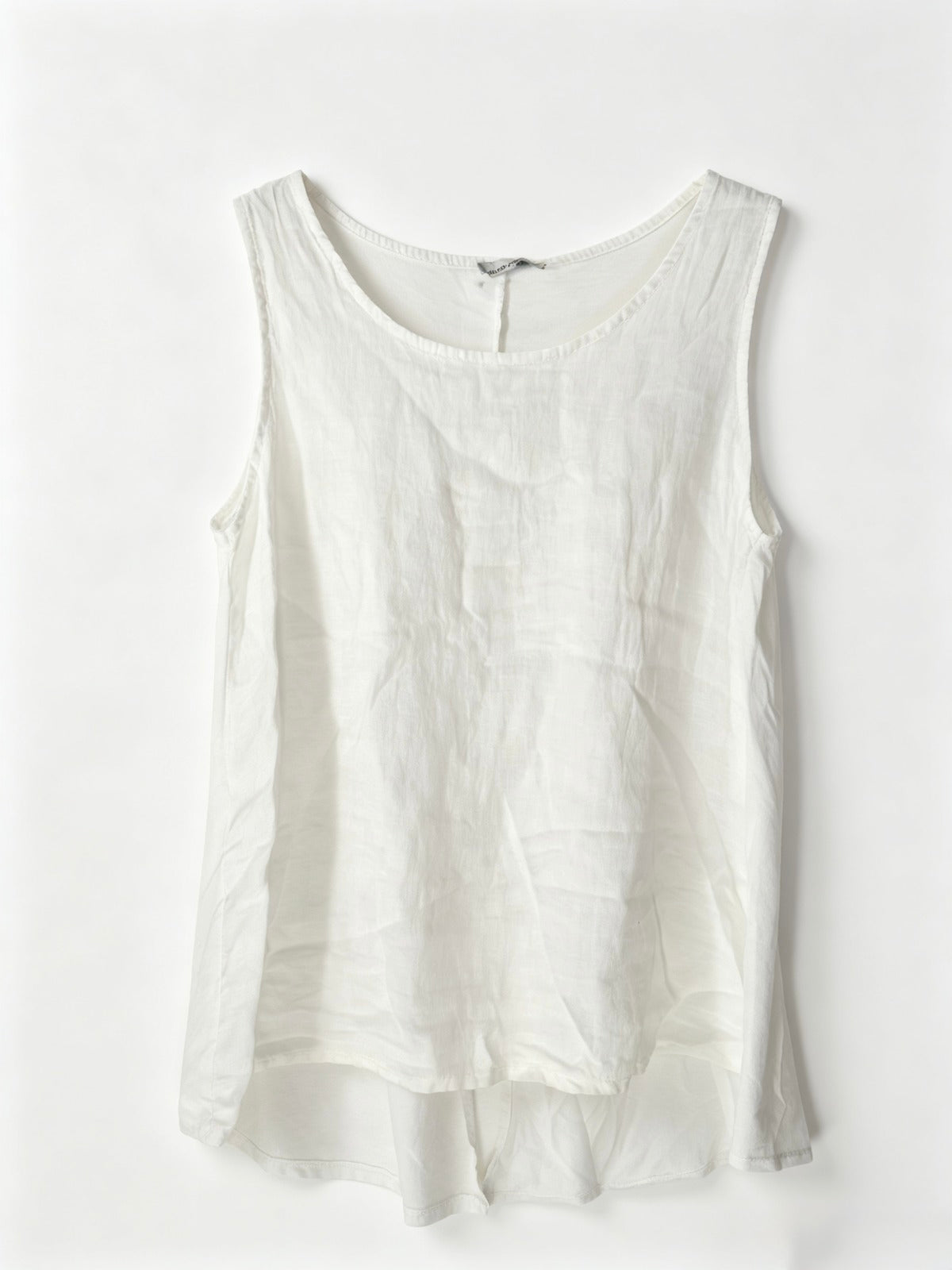 White sleeveless top on a white background