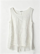 White sleeveless top on a white background