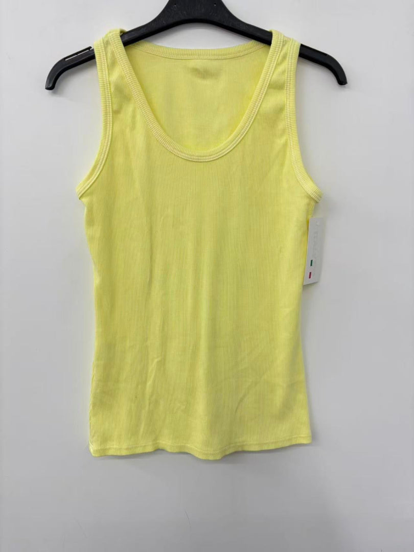 Yellow tank top on a hanger against a white background