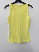 Yellow tank top on a hanger against a white background