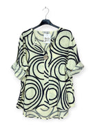 yellow printed top with feature button and v neck