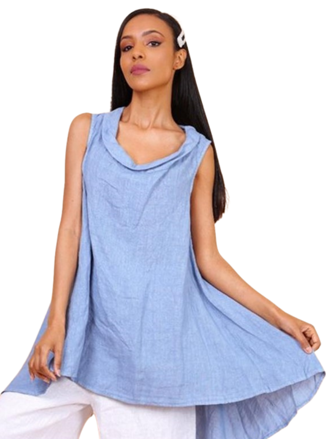 A woman wearing a sky blue sleeveless cowl neck top with an asymmetrical hem, paired with white trousers.